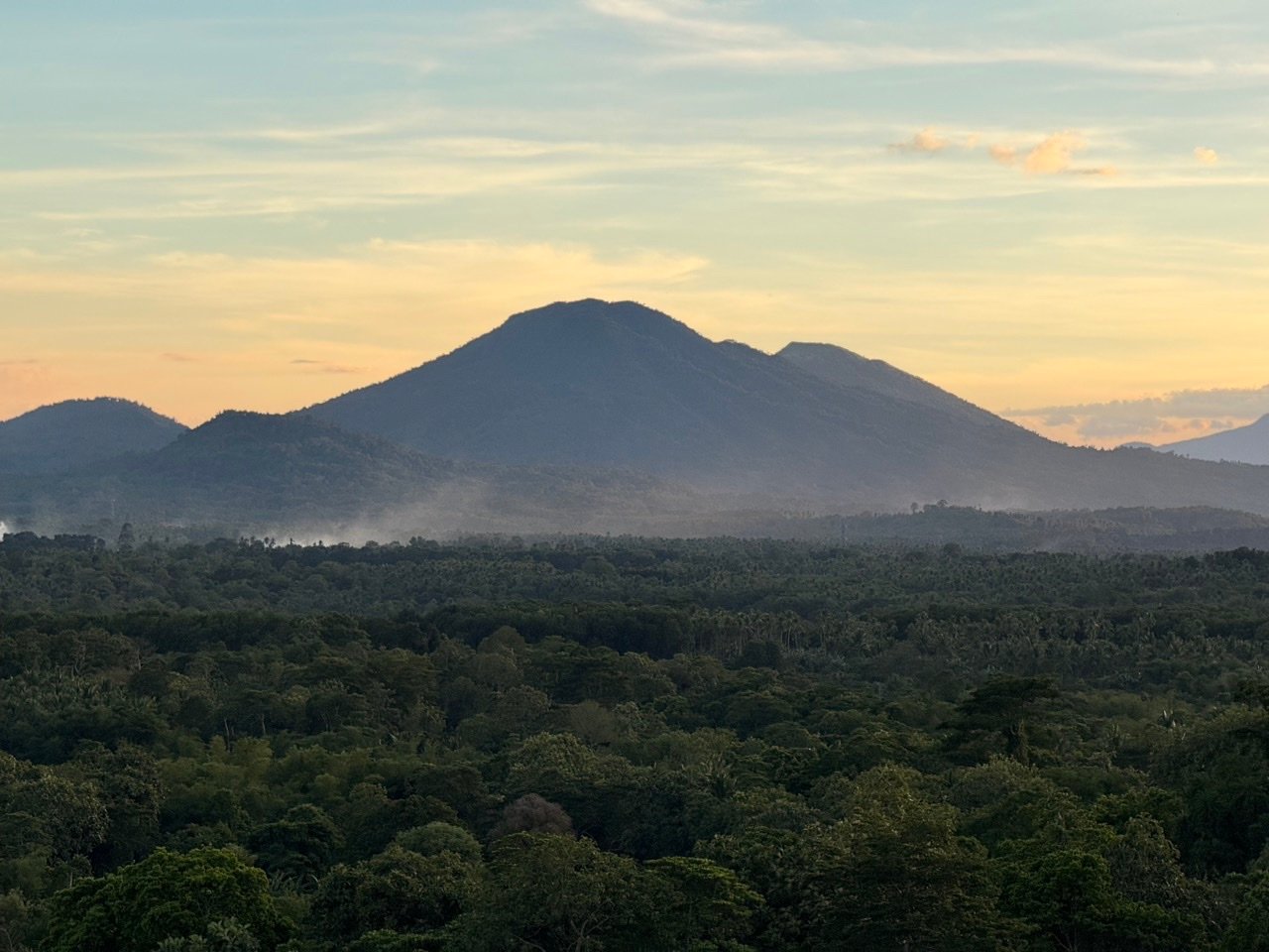 Mount Banahaw over the Majayjay rainforest at sunset